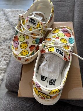 Hey Dude Kids Smiley World Canvas Sneakers in Yellow, Orange, Pink, Blue